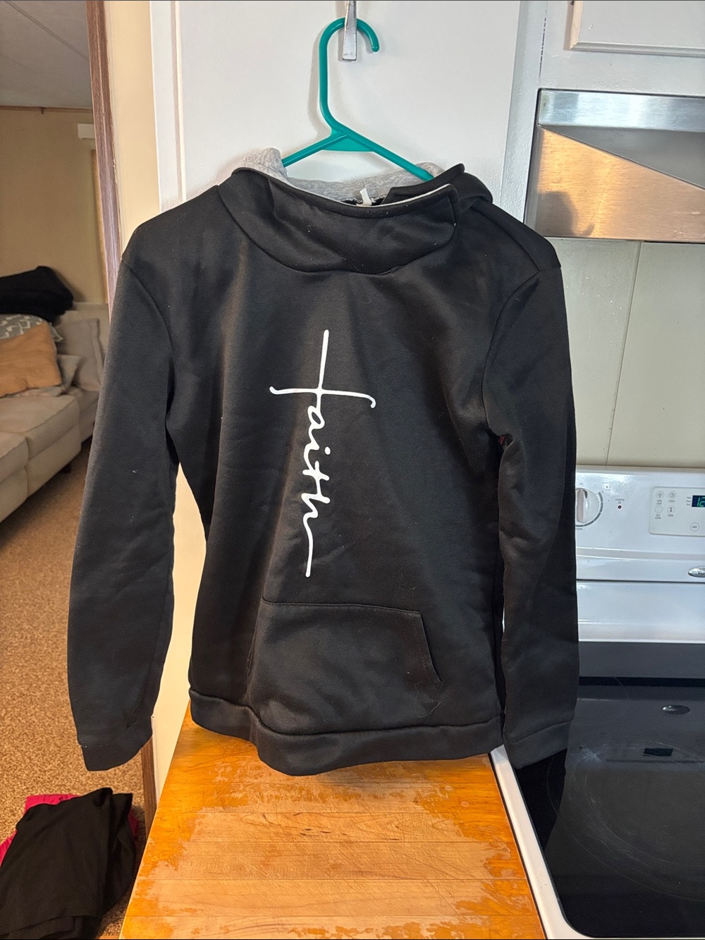Xuanshow Black Hoodie with White Vertical 'Faith' Script